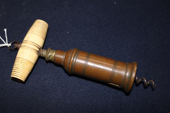 An ivory handle corkscrew